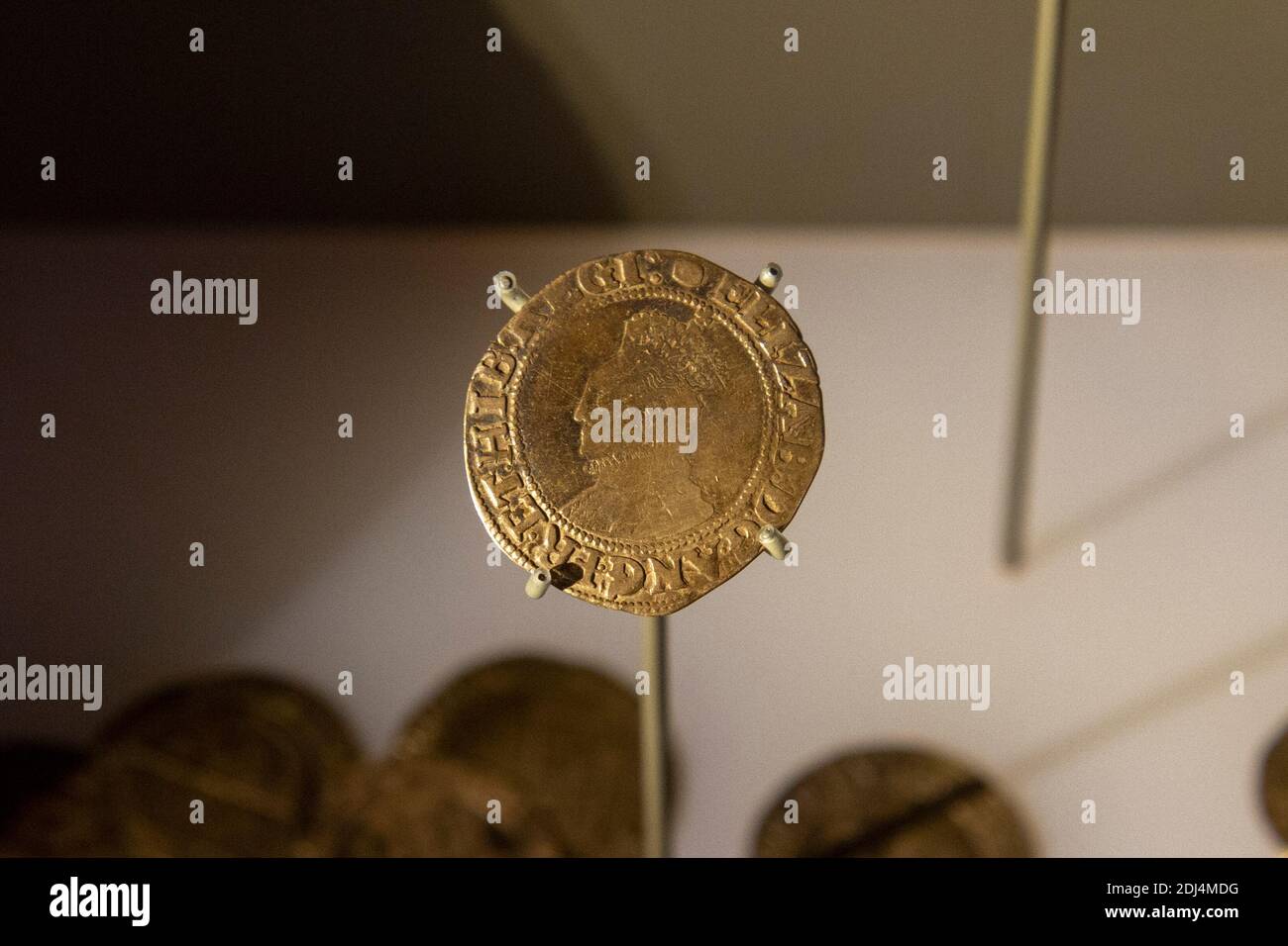 Close up of a silver coin from part of the Crankley Point Hoard on display in the National Civil War Centre, Newark Museum, Newark, Notts, UK. Stock Photo