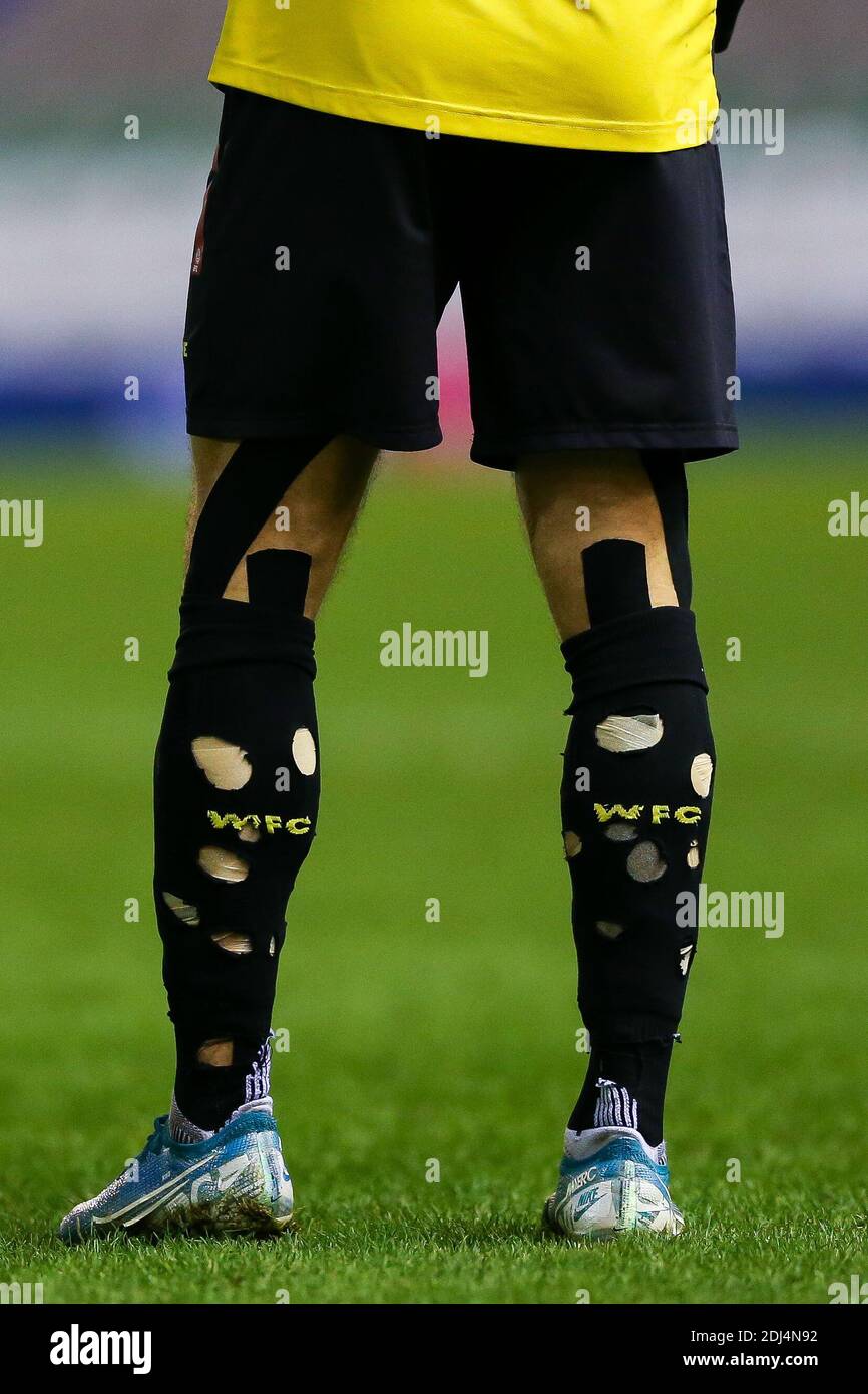 Holes are cut in the socks of Watford's Kiko Femenia during the Sky Bet  Championship match at St Andrew's Trillion Trophy Stadium, Birmingham Stock  Photo - Alamy