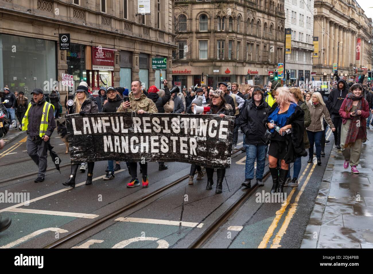 Manchester, UK. 12/12/2020: Around 1,000+ people gathered in Piccadilly, Manchester to protest against loss of freedoms due to governments reaction to corona virus Stock Photo