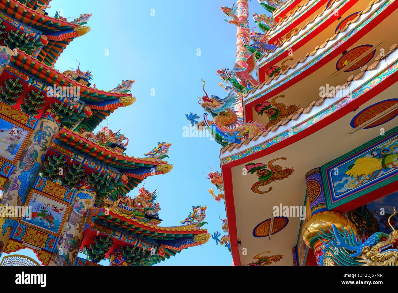 beautiful roof and pagoda of a Chinese temple during a sunny day  . Stock Photo