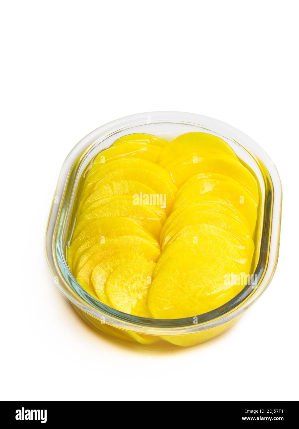Marinated daikon slice in glass bowl isolated on white Stock Photo Alamy