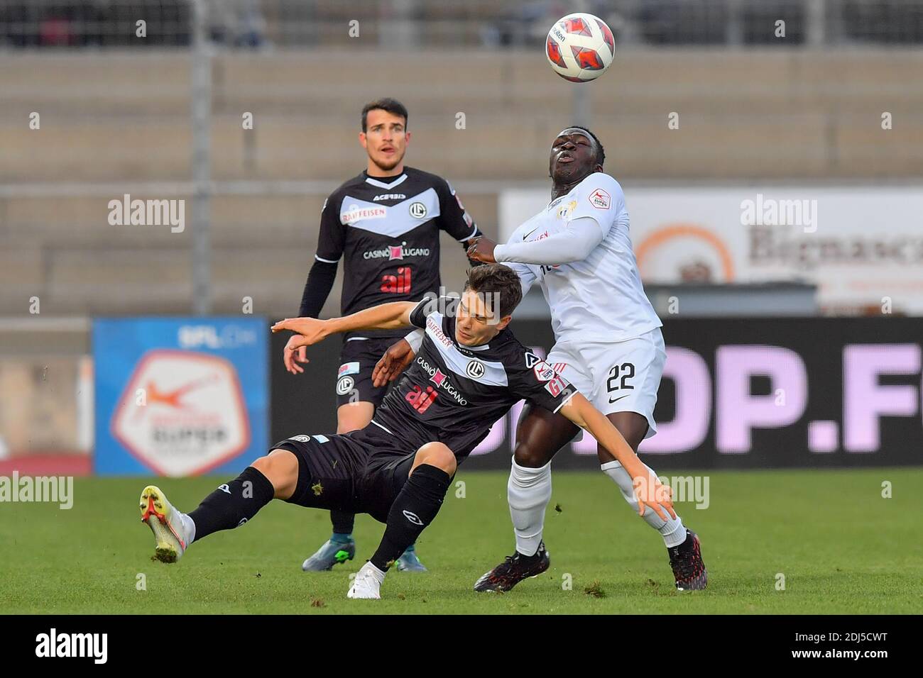 Lugano, Switzerland. 13th Dec, 2020. Stefano Guidotti (#22 FC Lugano) and Wilfried Gnonto (#22 Zurich) in action during the Swiss Super League match between FC Lugano and FC Zürich Cristiano Mazzi/SPP Credit: SPP Sport Press Photo. /Alamy Live News Stock Photo