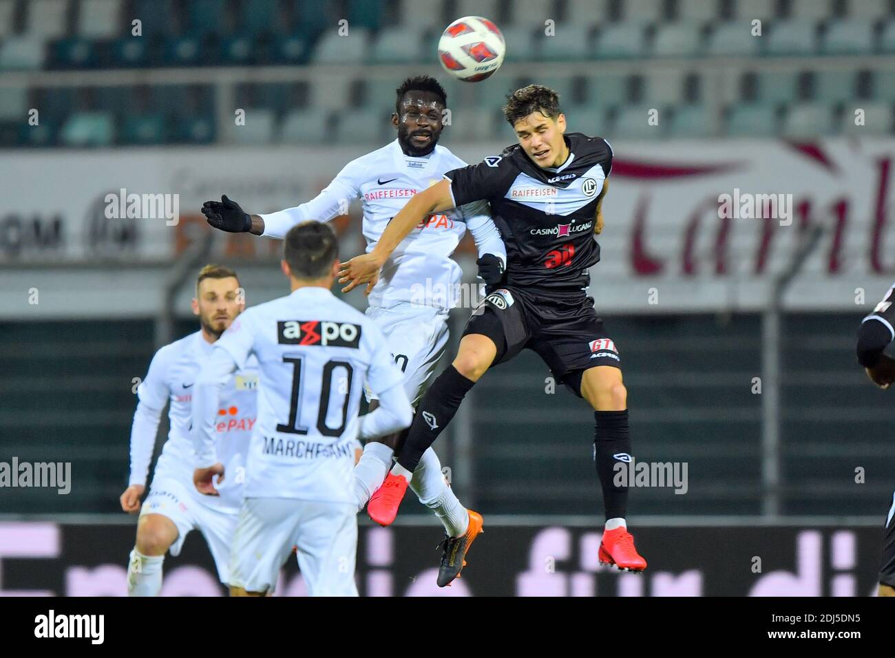 Lugano, Switzerland. 13th Dec, 2020. Ousmane Doumbia (#20 Zurich) and Stefano Guidotti (#22 FC Lugano) in action during the Swiss Super League match between FC Lugano and FC Zürich Cristiano Mazzi/SPP Credit: SPP Sport Press Photo. /Alamy Live News Stock Photo
