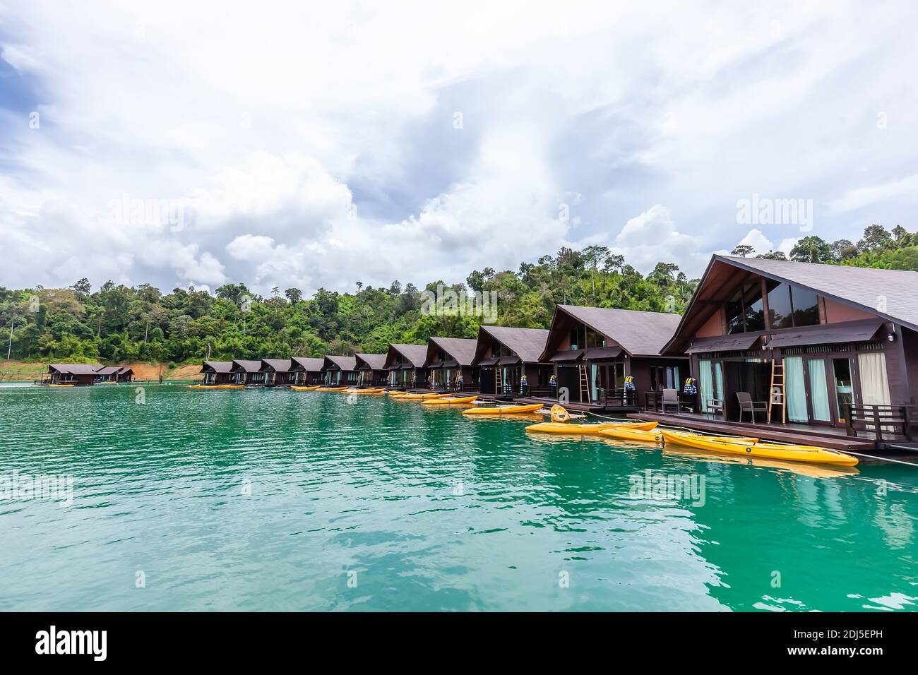 Luxury Resort with Floating Raft Houses on Green Lake with Tropical ...