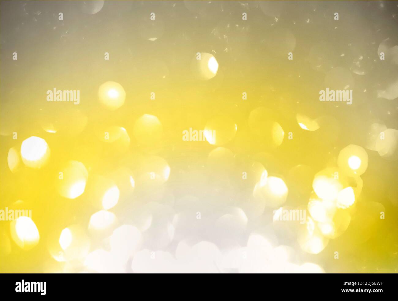 Abstract background of bright spots of lights shining with illuminating yellow and ultimate gray colors Stock Photo