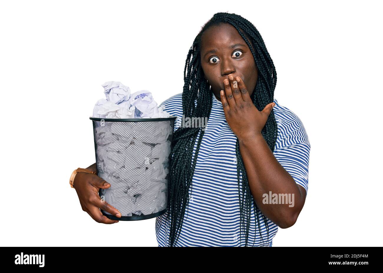 Afraid Paper Young black woman with braids holding paper bin full of crumpled papers ...