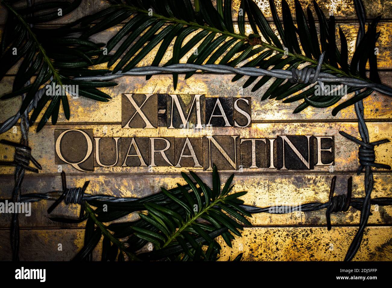 X-Mas Quarantine text on vintage textured bronze grunge copper and gold background Stock Photo
