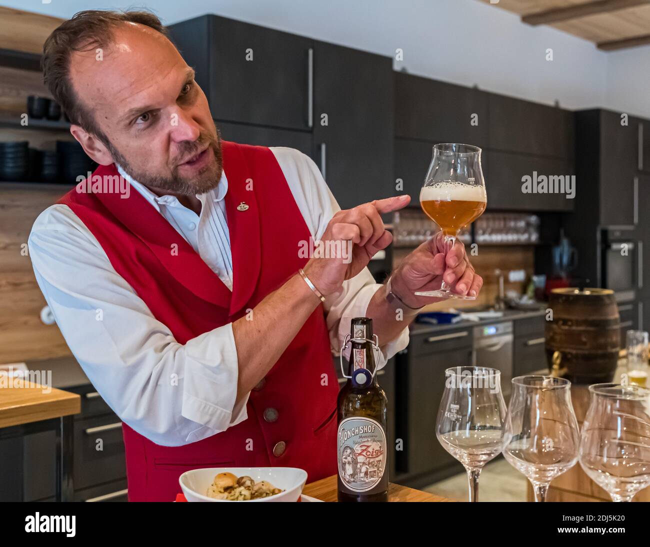 Beer-Tasting with Beer-Sommelier in Kemnath-Waldeck, Germany. A beer sommelier is always a storyteller and combines his beer knowledge with anecdotes about brewing and drinking beer. Stock Photo