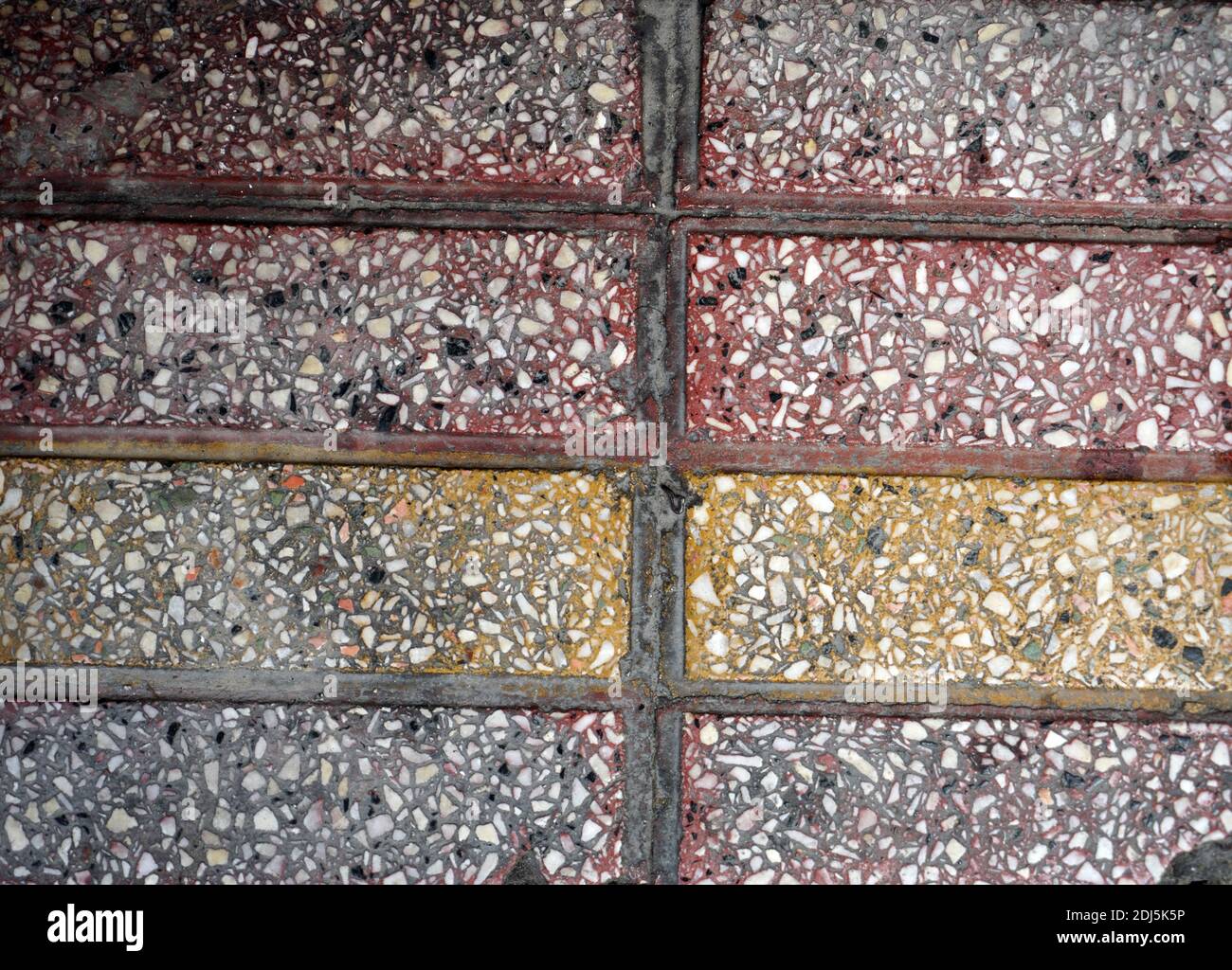 Colorful cobblestone stones laid on the ground. For background Stock Photo