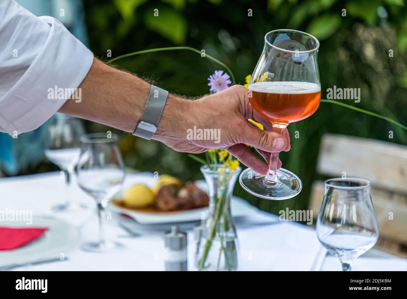 An aperitif no longer has to be a cocktail or crémant. In France, beer is also increasingly drunk on this occasion Stock Photo