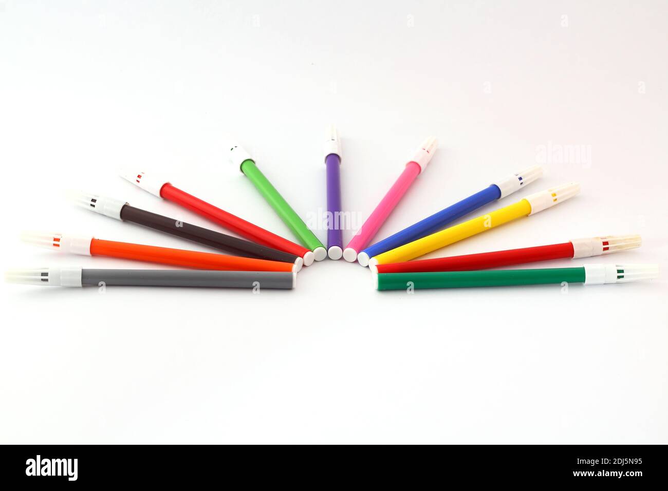 Multicolored markers for drawing. Markers on a white isolated