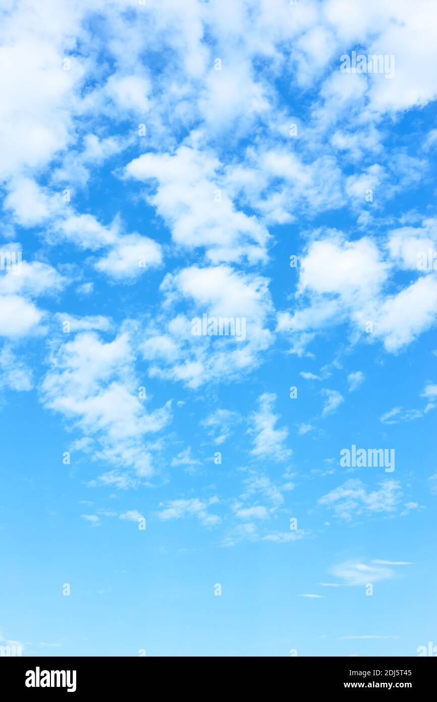 Blue sky with white clouds - vertical background with space ror your own  text Stock Photo - Alamy