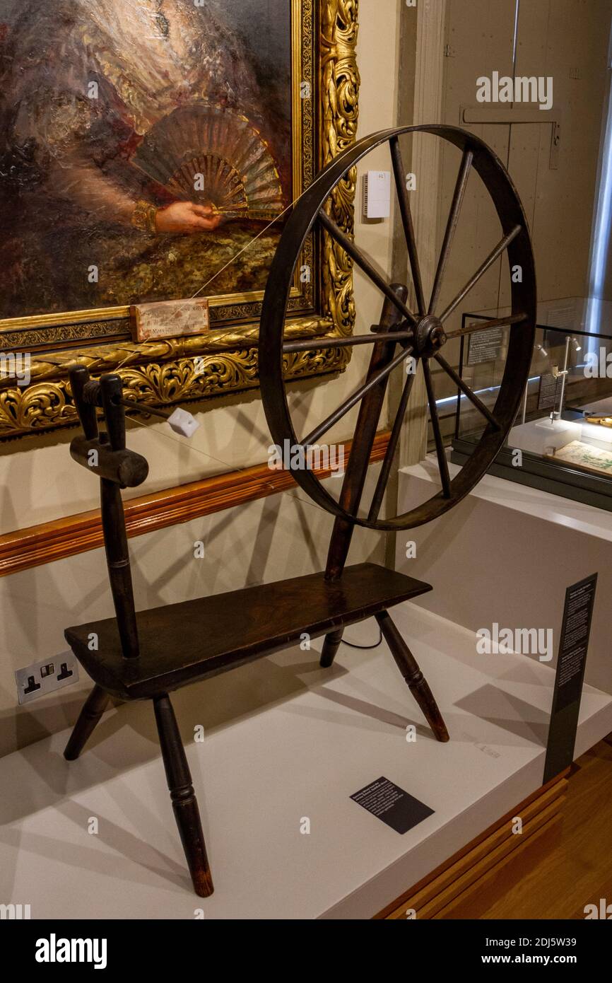 Spinning wheel from the Jersey School on display in the National Civil War Centre, Newark Museum, Newark-on-Trent, Notts, UK. Stock Photo