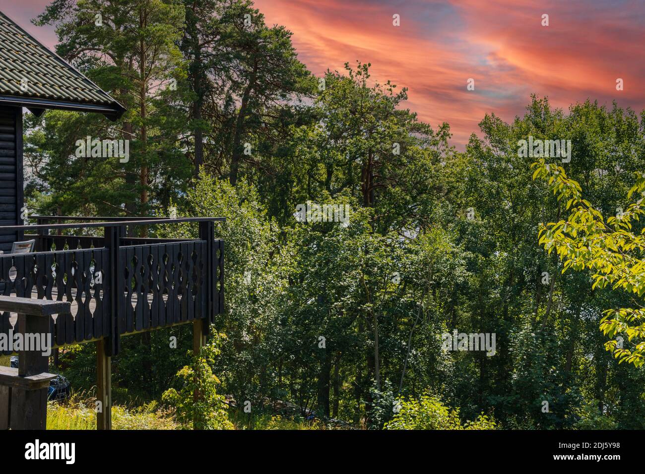 Sunrise old red wooden house hi-res stock photography and images - Alamy