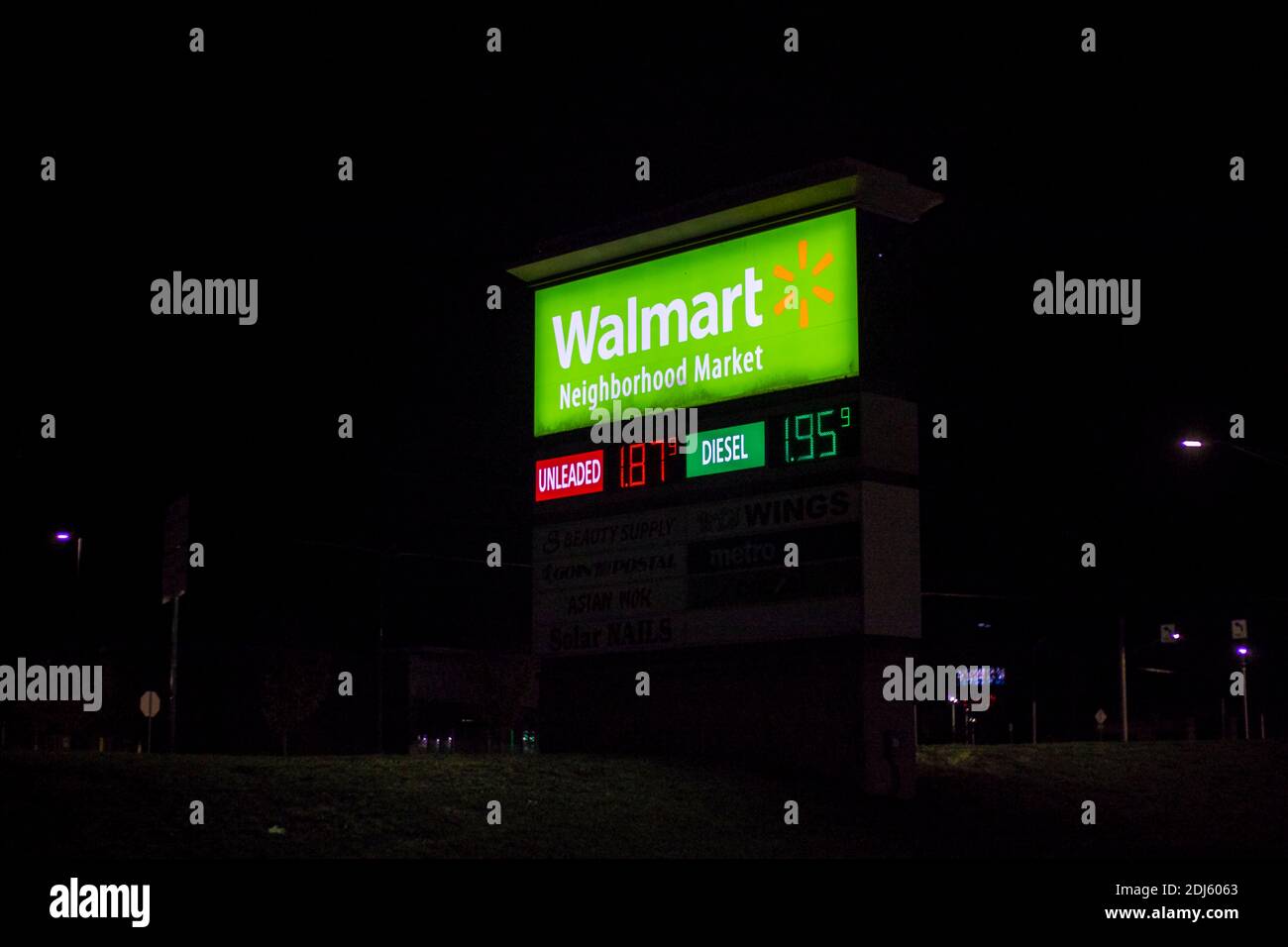 Augusta, Ga USA - 11 04 20: Walmart Neighborhood Market gas street sign at night Stock Photo