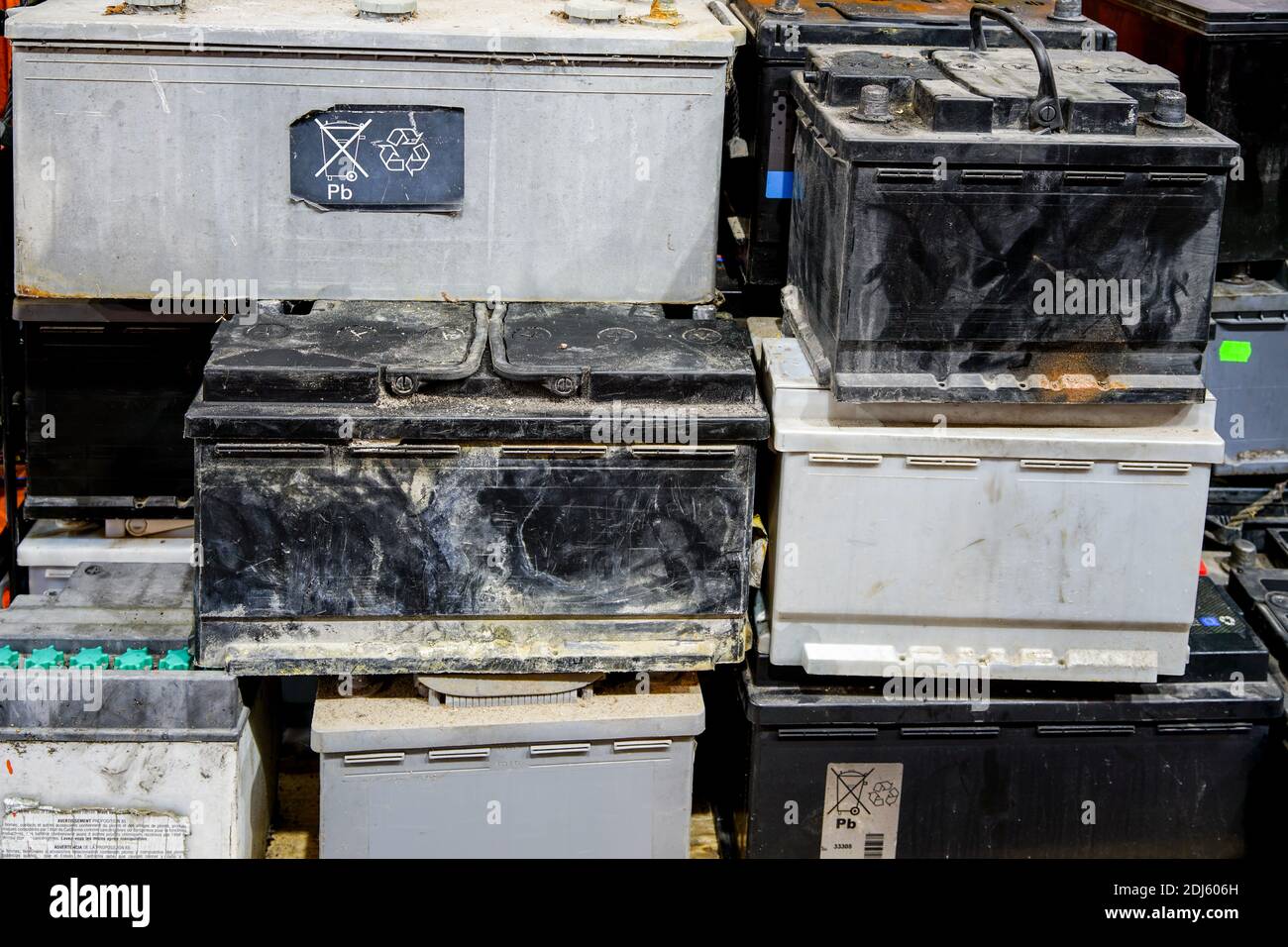 A pallet with used car batteries awaiting recycling at a metal