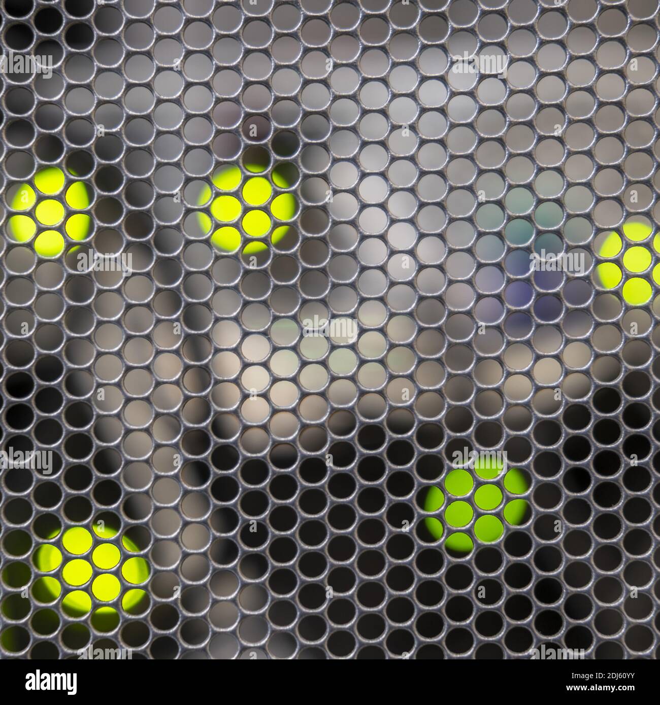 Metal grid background with blurred background and wires Stock Photo - Alamy
