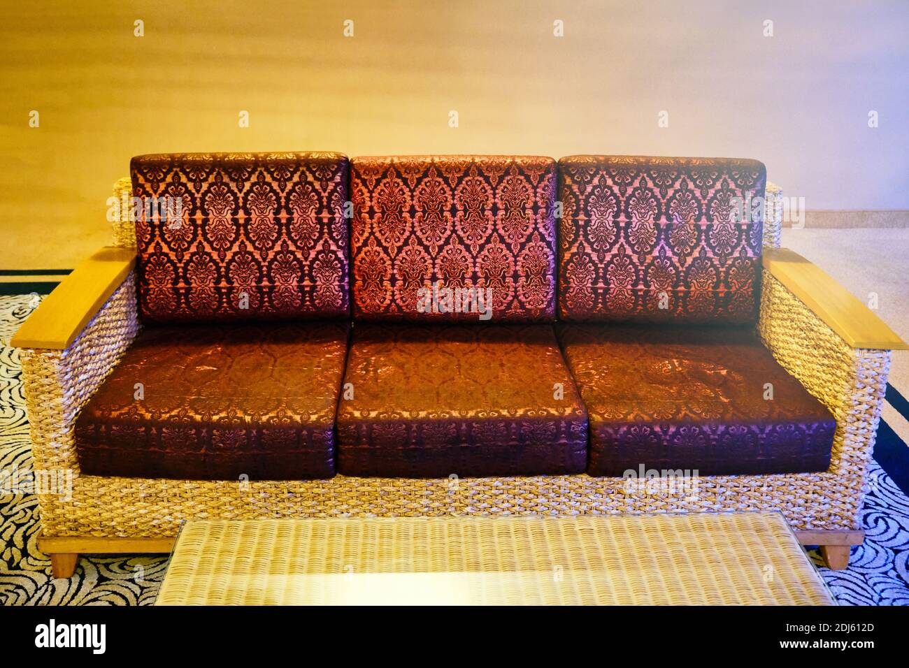 Arabic red sofa with traditional ornament. Furniture in Arabic style