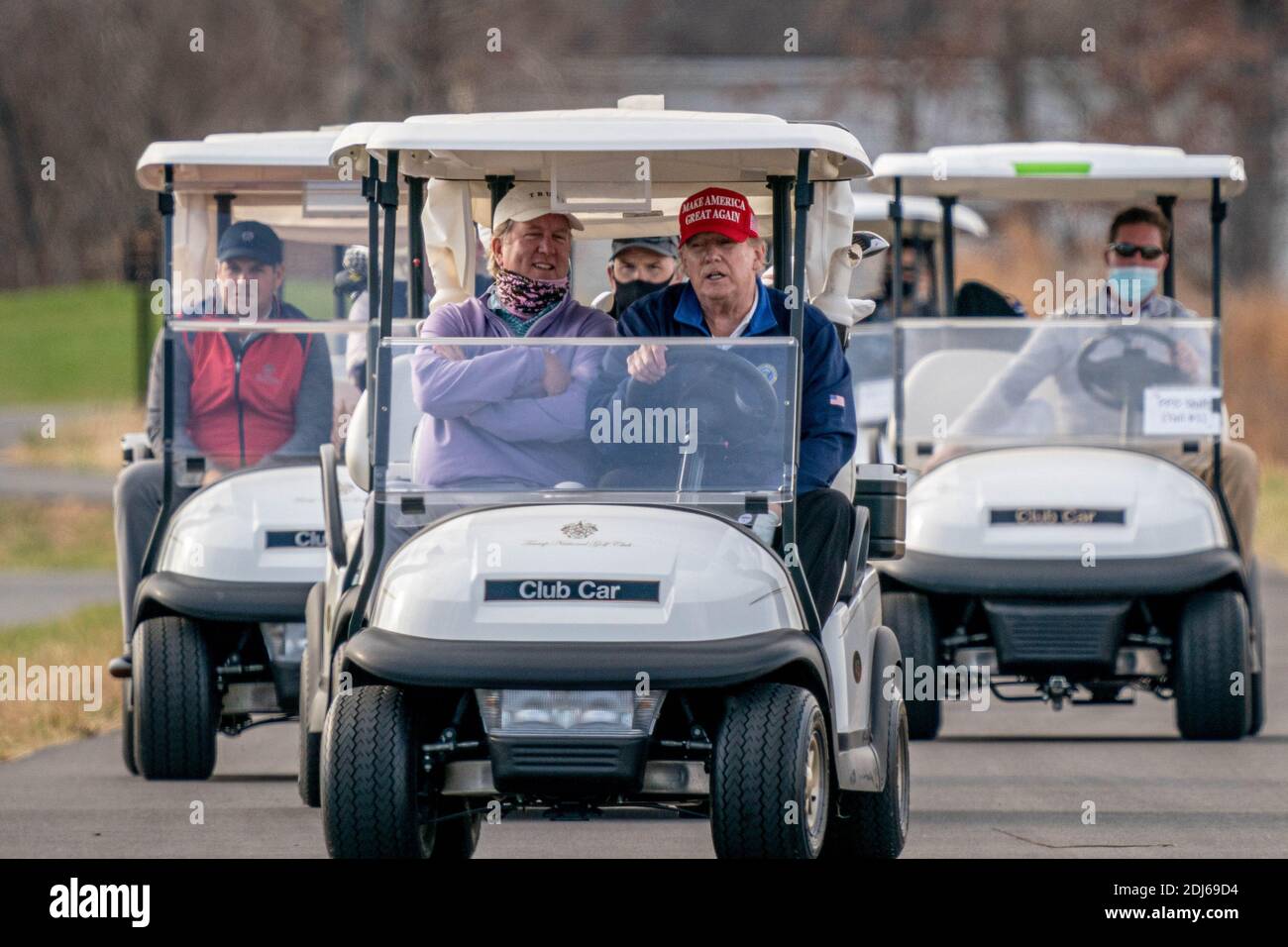 Washington, United States. 13th Dec, 2020. United States President Donald J. Trump drives his golf cart, number 45, as he plays golf at Trump National Golf Club in Sterling, Virginia on Sunday, December 13, 2020. Photo by Ken Cedeno/UPI Credit: UPI/Alamy Live News Stock Photo