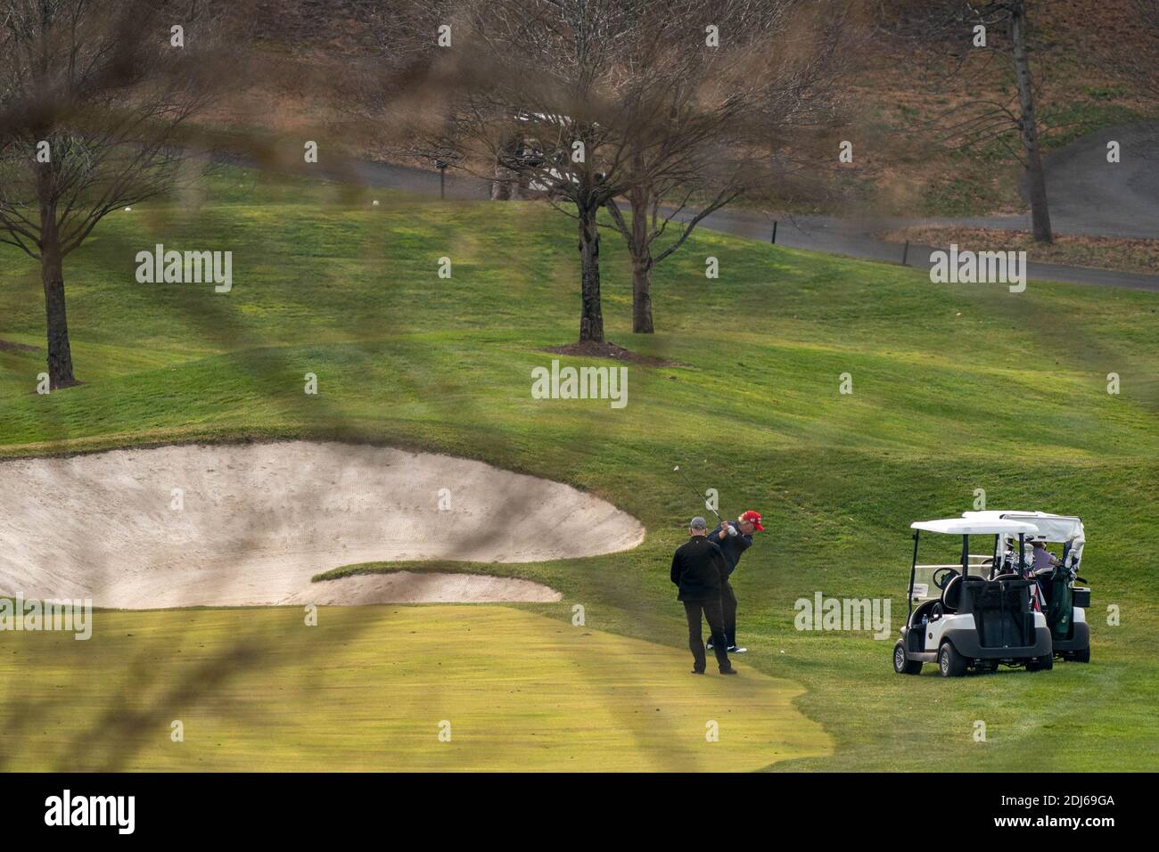 Washington, United States. 13th Dec, 2020. United States President Donald J. Trump plays golf at Trump National Golf Club in Sterling, Virginia on Sunday, December 13, 2020. Photo by Ken Cedeno/UPI Credit: UPI/Alamy Live News Stock Photo
