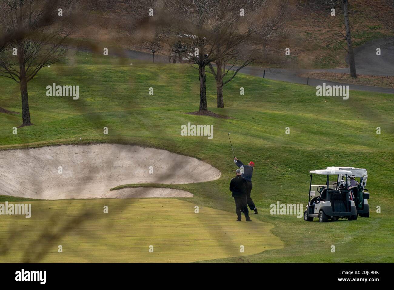Washington, United States. 13th Dec, 2020. United States President Donald J. Trump plays golf at Trump National Golf Club in Sterling, Virginia on Sunday, December 13, 2020. Photo by Ken Cedeno/UPI Credit: UPI/Alamy Live News Stock Photo