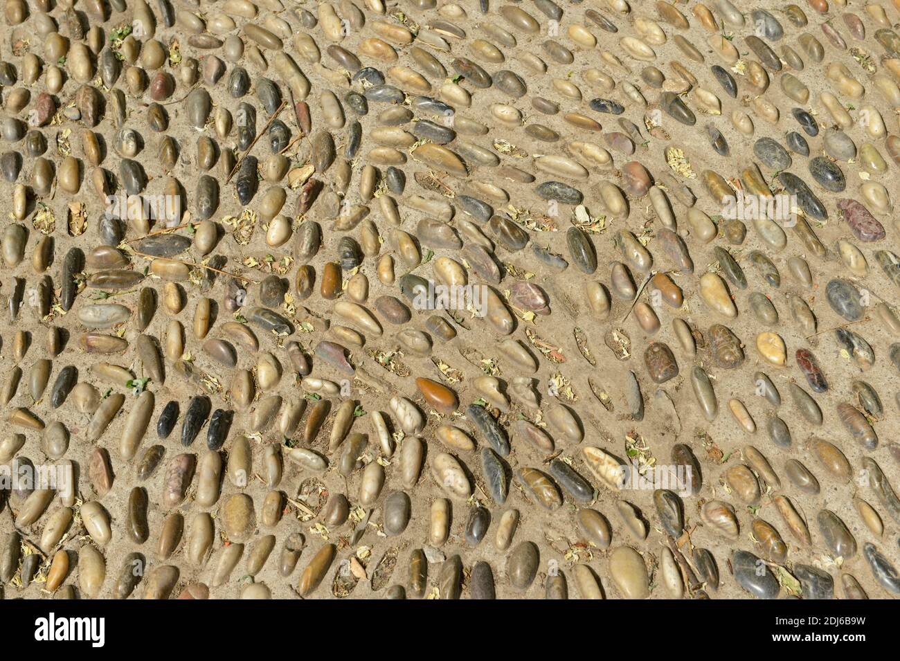 Unusual paving with raised pebbles in Linglong park, Beijing, China