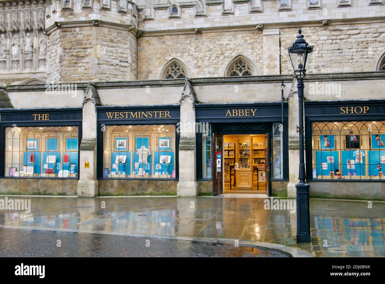Westminster Abbey Shop front window with doors open but no customers on a weekend in December 2020. Christian shop selling religious books & souvenirs Stock Photo