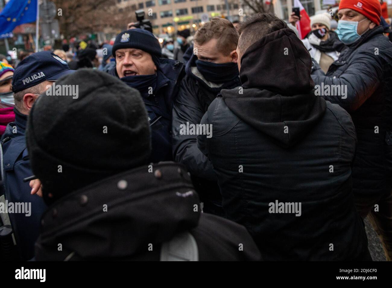 Warsaw, mazowieckie, Poland. 13th Dec, 2020. December 18, 2020, Warsaw, The general strike on December 13, 2020 began at 12.00. On the 39th anniversary of the introduction of martial law in Poland, protests by the largest anti-government circles are taking place in Warsaw. Among others, they protest Women's Strike, Entrepreneurs' Strike and the Eight-Star Movement Credit: Grzegorz Banaszak/ZUMA Wire/Alamy Live News Stock Photo