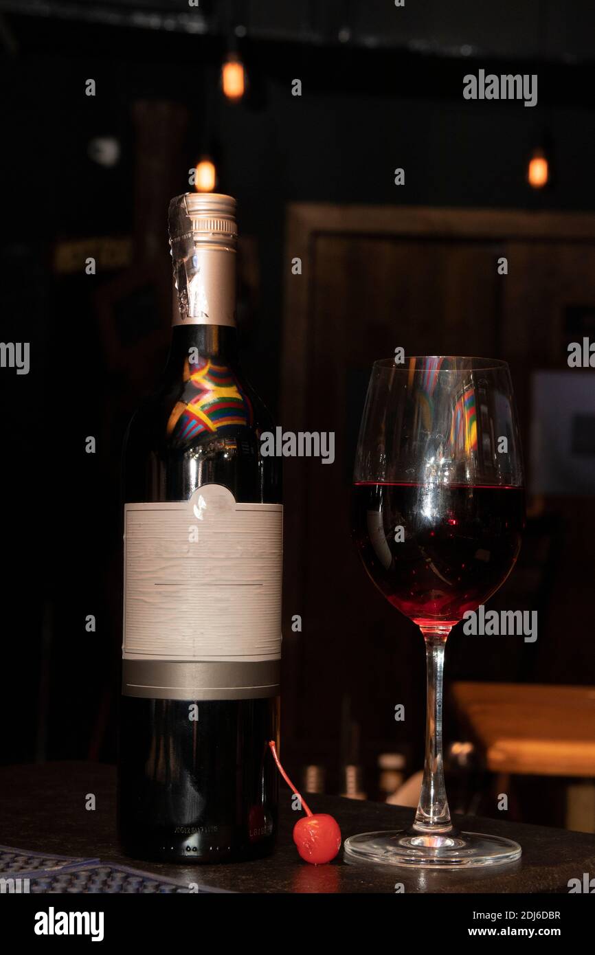 Red wine is a type of wine made from darkcolored grape varieties Stock