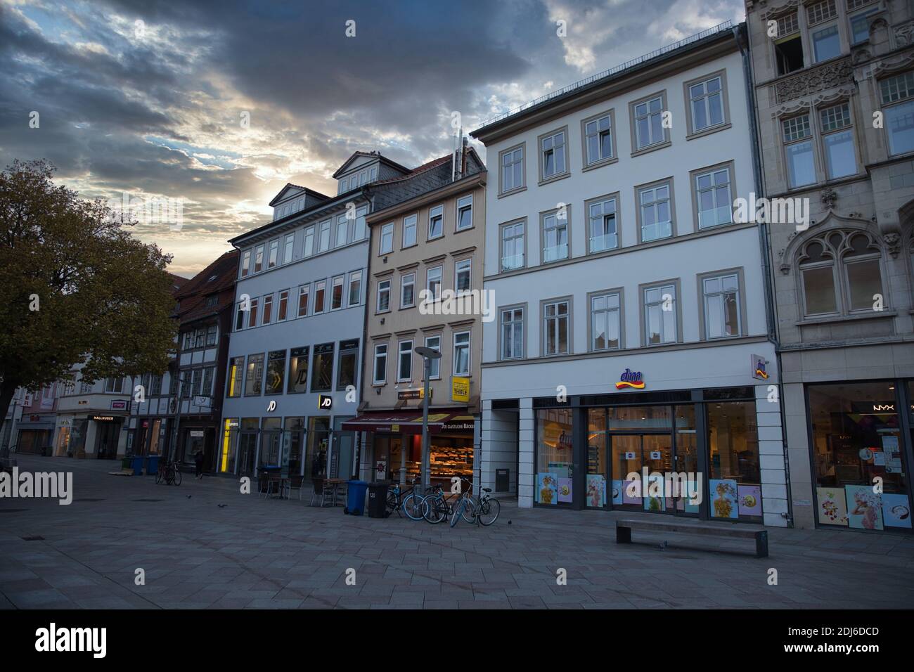Gottingen Germany. Autumn, 2020. Empty pedestrian street and shops with epic sky. Stock Photo