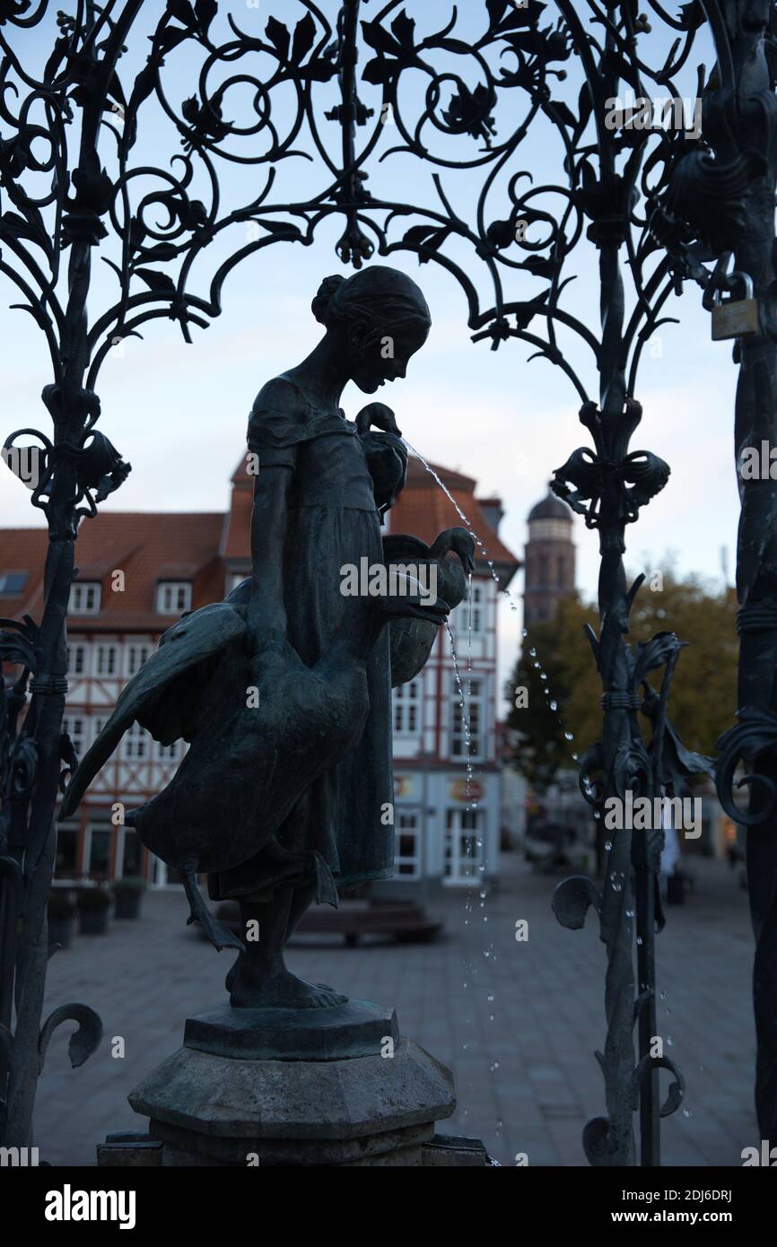 Goose girl fountain statue silhouette in Gottingen Germany. Profile view. Stock Photo