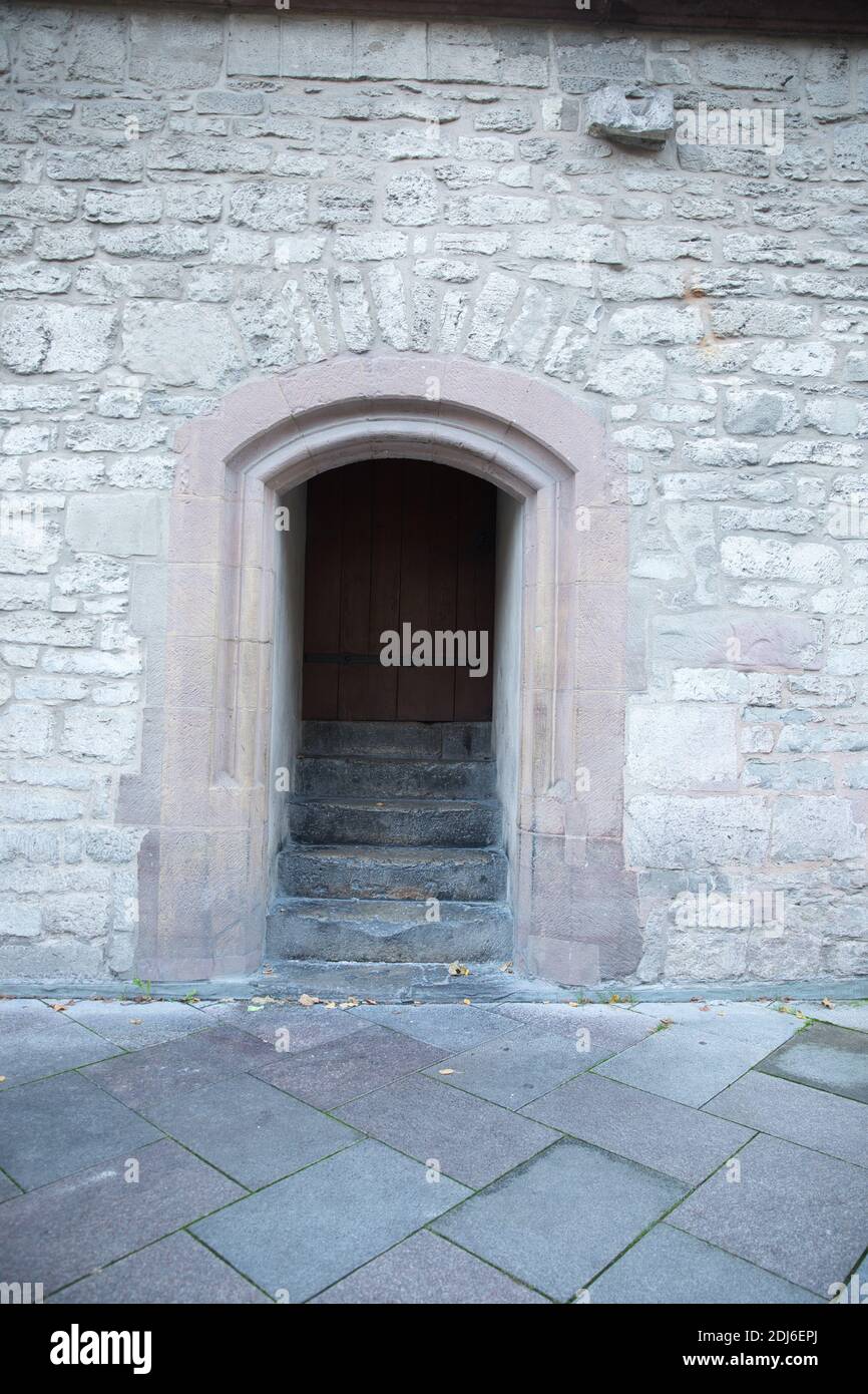Entrance to medieval town hall with staircase. Göttingen, Germany. Vertical. Stock Photo