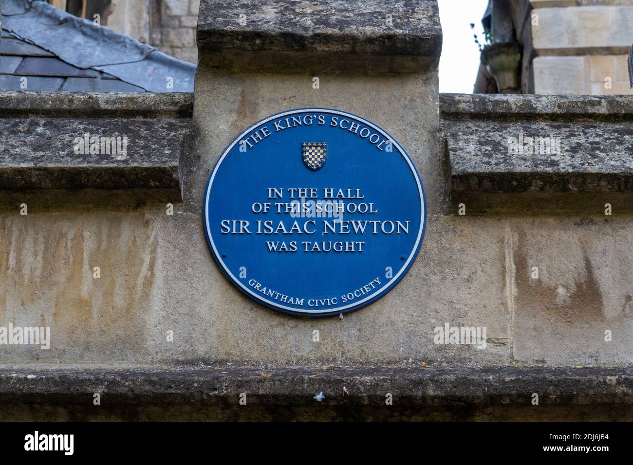 Blue plaque for Sir Isaac Newton on the wall of  Kings School hall, where Newton was educated 1655-60, Grantham, Lincolnshire, UK. Stock Photo