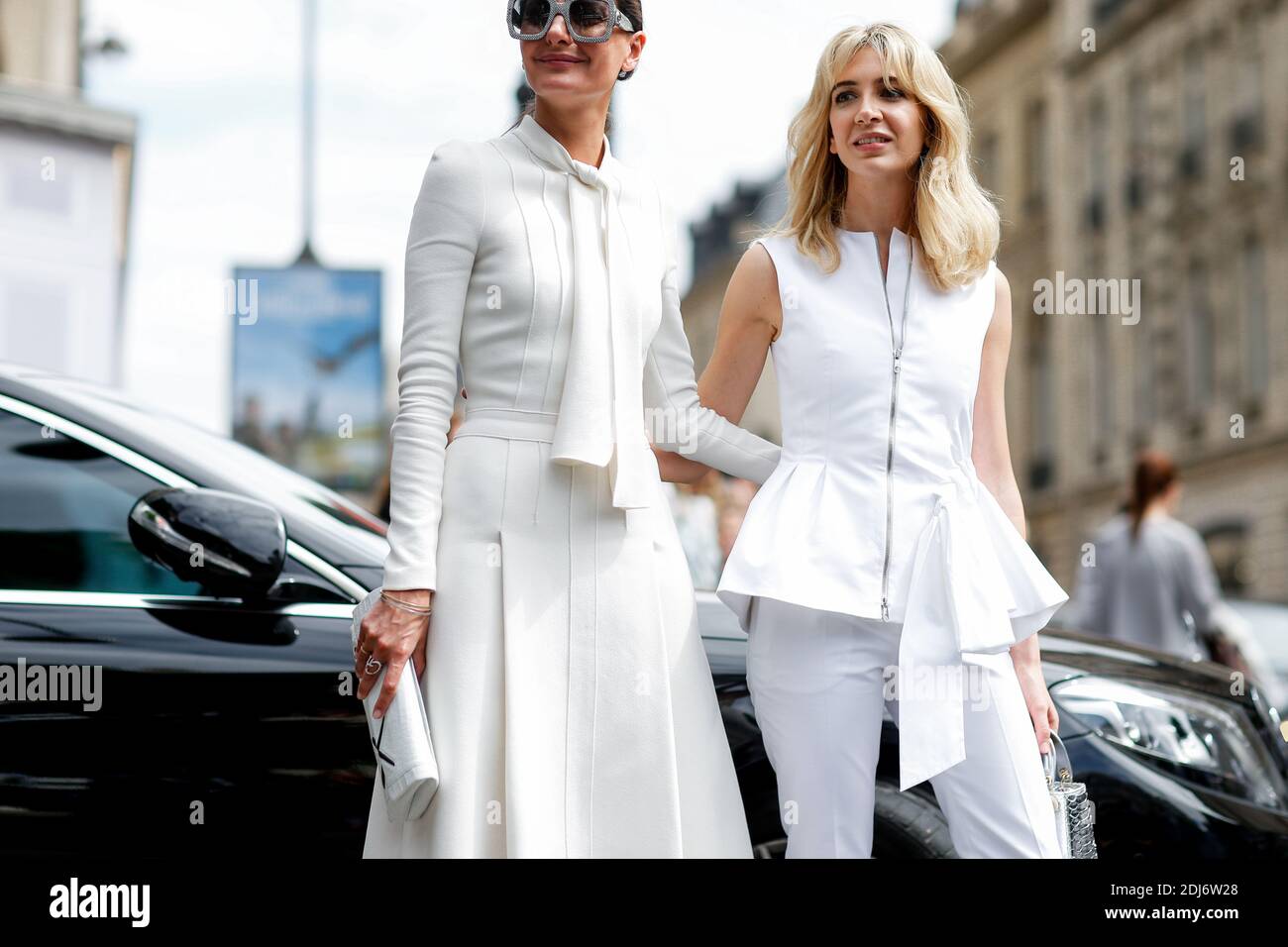 Street style, Giovanna Battaglia and Sabine Ghanem arriving at Dior  Fall-Winter 2016-2017 Haute Couture
