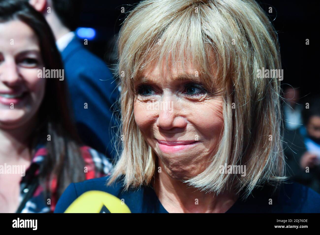 Brigitte Trogneux, the wife of French Minister of the Economy, Industry and  the Digital Sector and 'En Marche' movement leader Emmanuel Macron during  his first political meeting at Maison de la Mutualite