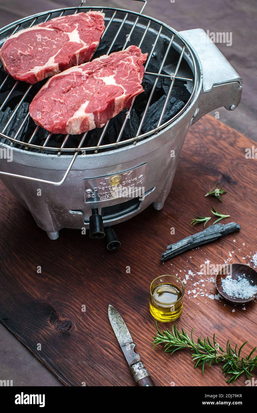 Barbecue steak on a bbq grill Stock Photo