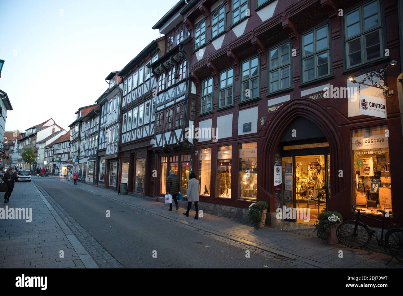 Göttingen Germany. Autumn, 2020. Old town shops and architecture on narrow street. Vanishing point. Stock Photo