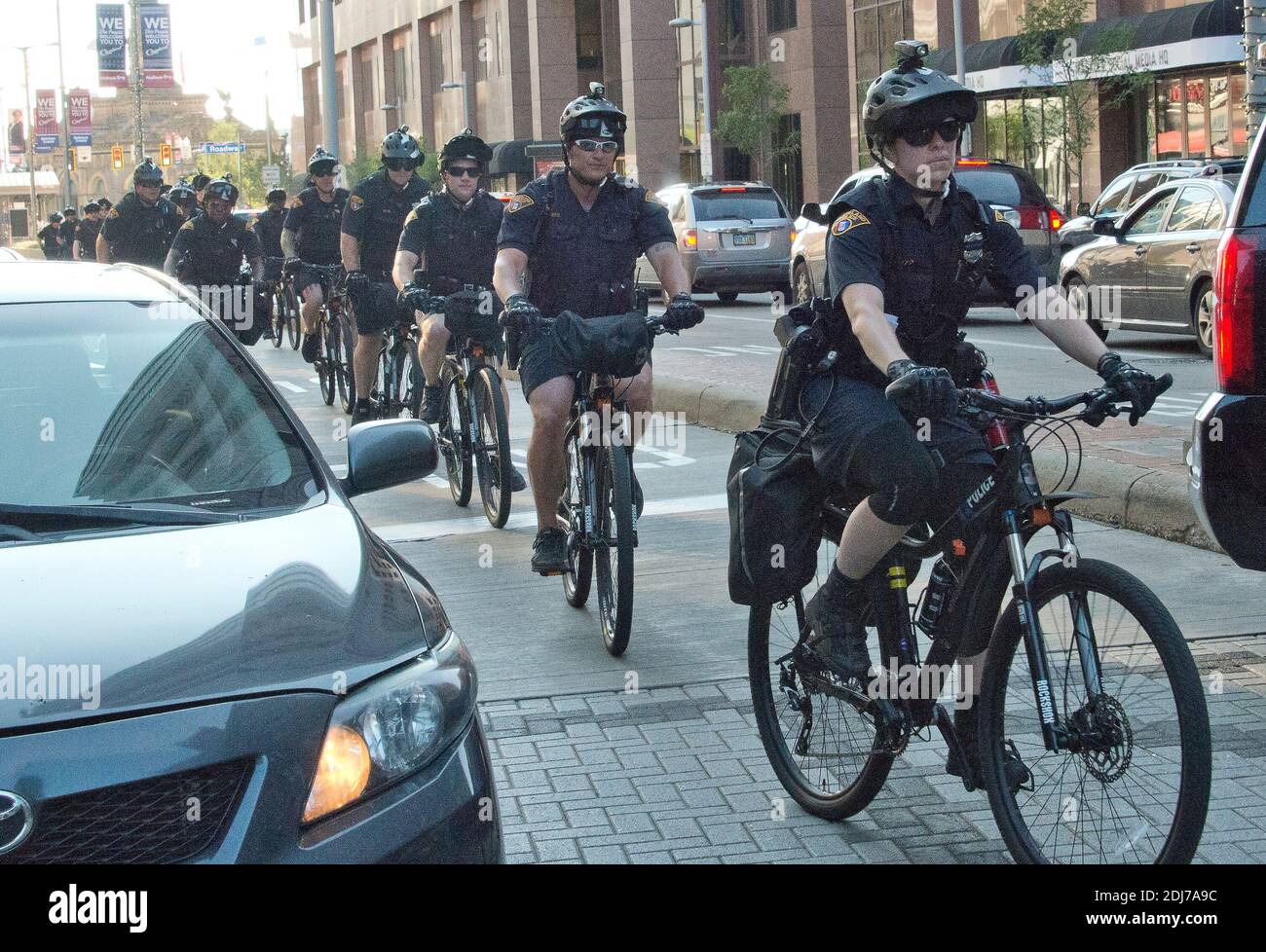 Police officers on bicycles ride down Euclid Avenue about two blocks from the Quicken Loans Arena, site of the 2016 Republican National Convention in Cleveland, Ohio, USA, on Saturday, July 16, 2016. Photo by Ron Sachs/CNP/ABACAPRESS.COM Stock Photo