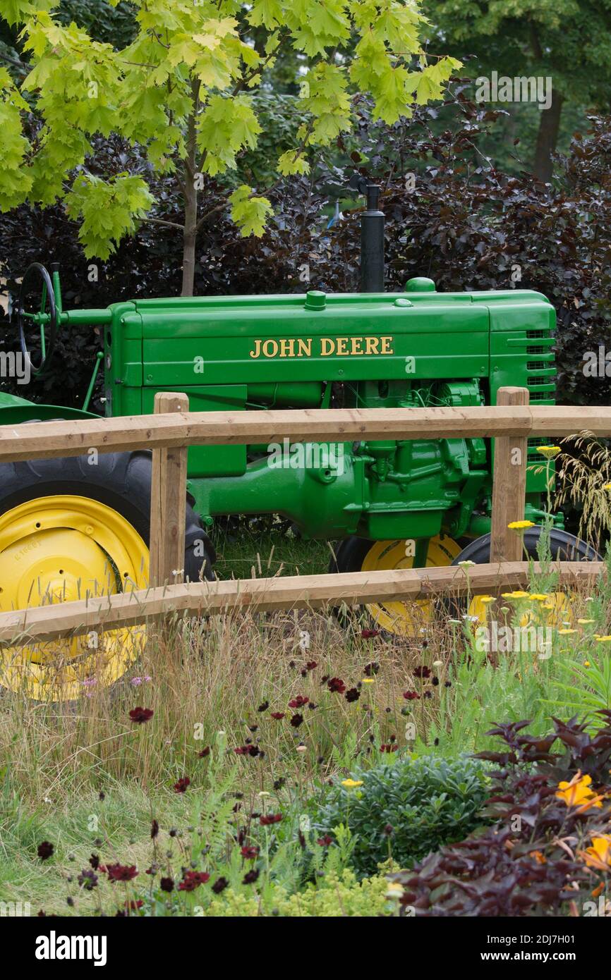 A restored vintage John Deere tractor Stock Photo Alamy