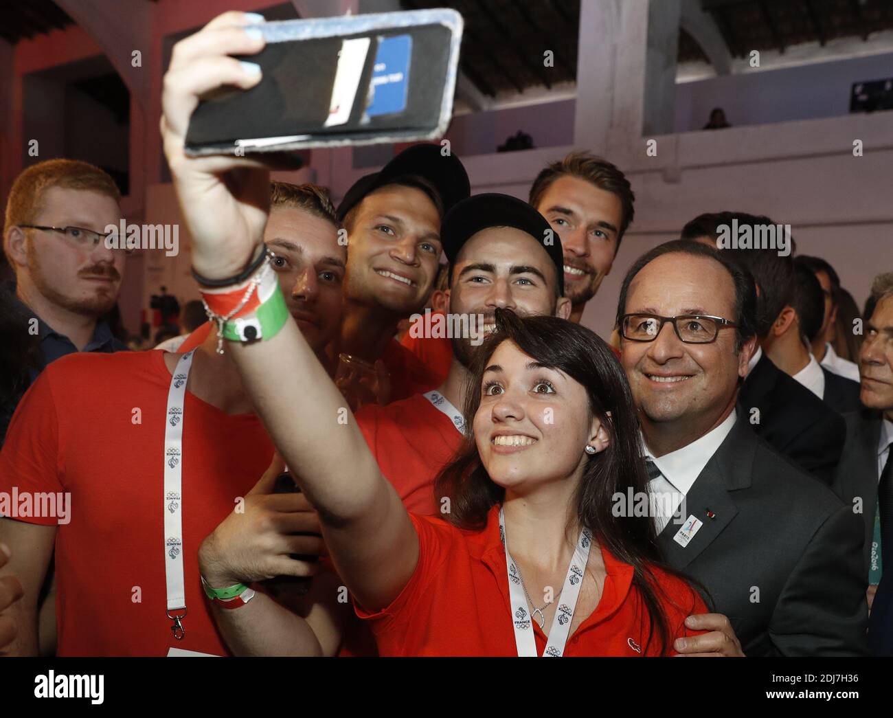 French President Francois Hollande (R) poses for selfies as he visits the Club France, on August 5, 2016 before the start of the Rio 2016 Olympic Games in Rio de Janeiro. The carnival capital of Rio de Janeiro will host a glittering Olympics opening ceremony party on Friday, hoping to draw a line under a turbulent seven-year build-up dogged by recession, drugs scandals, crime and infrastructure stumbles. Photo by Jack Guez/Pool/ABACAPRESS.COM Stock Photo