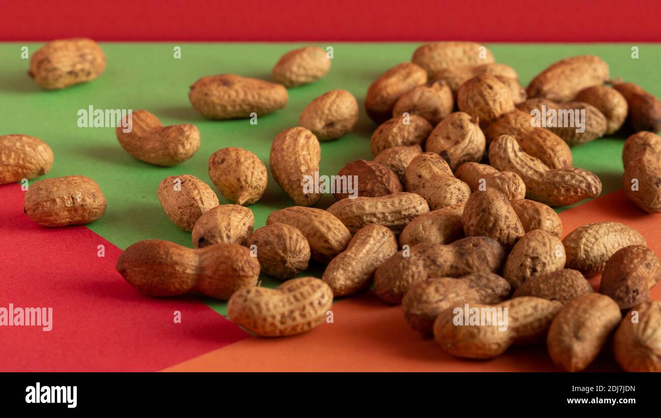 Peeled peanut on well peanuts. Peanuts in the shell raw Stock Photo Alamy