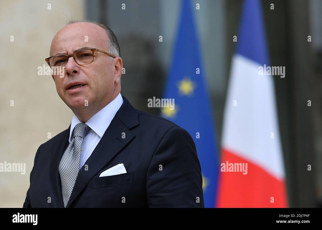 Minister of the Interior Bernard Cazeneuve delivers a statement to the  media after a restricted Defence and Security Council summoned by President  Francois Hollande at the Elysee Palace, in Paris, France on