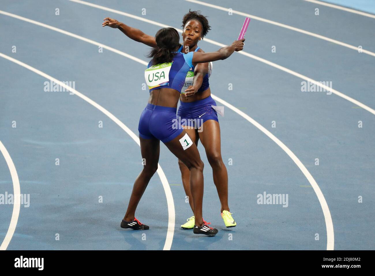 USA's team won a gold medal in the 4X100 m relay women final in Olympic