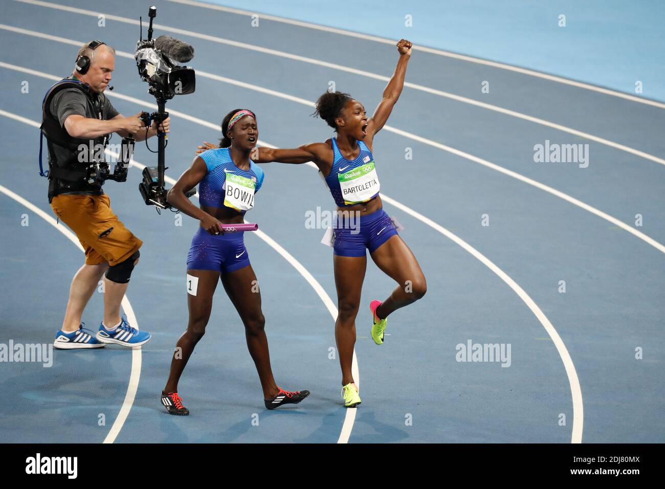 USA's team won a gold medal in the 4X100 m relay women final in Olympic ...