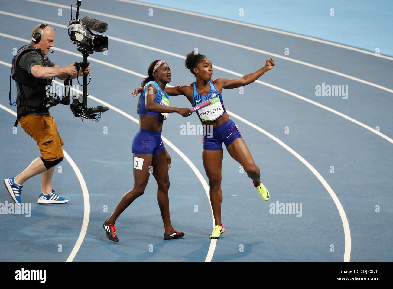 USA's team won a gold medal in the 4X100 m relay women final in Olympic ...