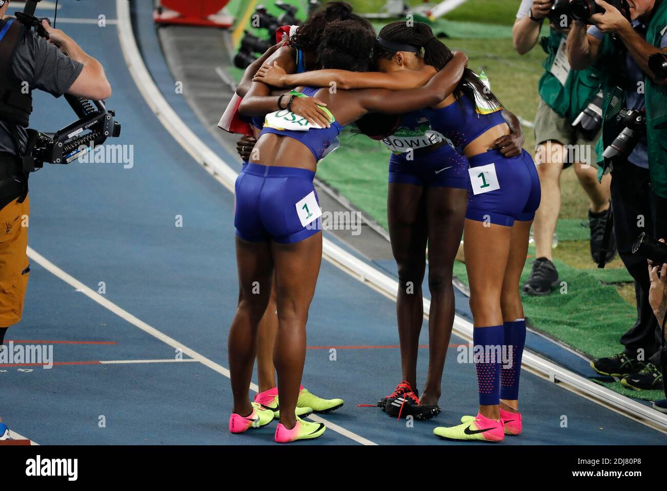 USA's team won a gold medal in the 4X100 m relay women final in Olympic