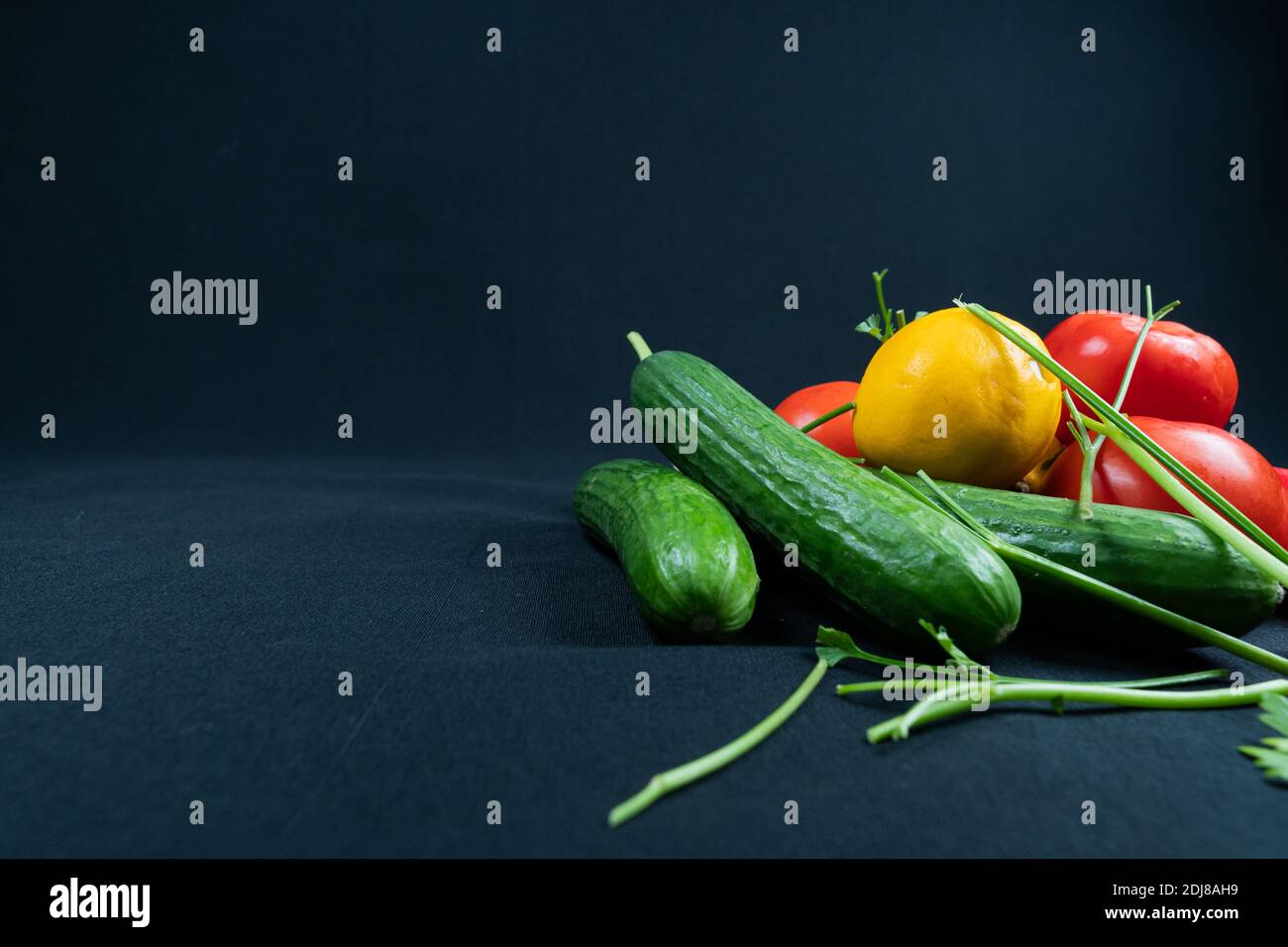 Fresh vegetables on black background Stock Photo