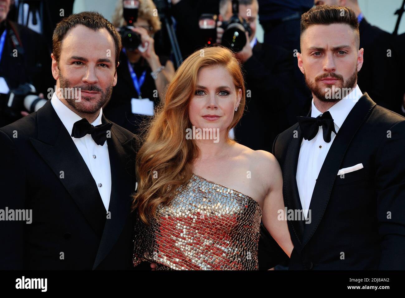 Tom Ford, Amy Adams and Aaron Taylor-Johnson attending the 'Nocturnal  Animals' Premiere on the Lido in Venice, Italy as part of the 73rd Mostra,  Venice International Film Festival on September 02, 2016.