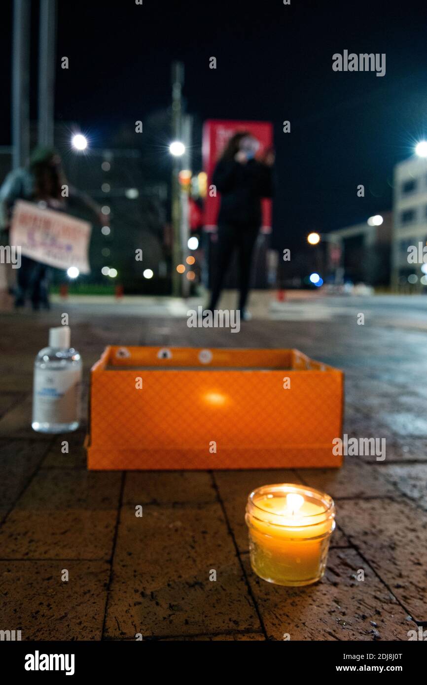 Philadelphia, Pennsylvania, USA. 12th Dec, 2020. Members of the statewide campaign, Put People First-PA, the Nonviolent Medicaid Army and the National Union for the Homeless, gathered in front of Temple University's North Philadelphia hospital campus bringing attention to the extreme pressures healthcare facilities are facing as the Covid-19 pandemic rages across the US, killing over 3000 people a day. The groups claim the root of the crisis is a healthcare system that puts profits over people resulting in short staffing, longer shifts, and inadequate protections. Members also gathered onli Stock Photo