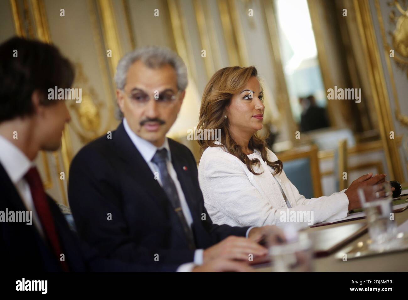 Saudi business magnate, investor, and philanthropist Prince Al-Waleed Bin Talal bin Abdulaziz al Saud (Al-Walid ben Talal ben Abdelaziz Al Saoud) flanked by his Assisant Executive Manager for Travel and External Affairs Department Hassna Alturki during a meeting with French President Francois Hollande at the Elysee Palace in Paris, France on September 8, 2016. Photo by Denis Allard/Pool/ABACAPRESS.COM Stock Photo